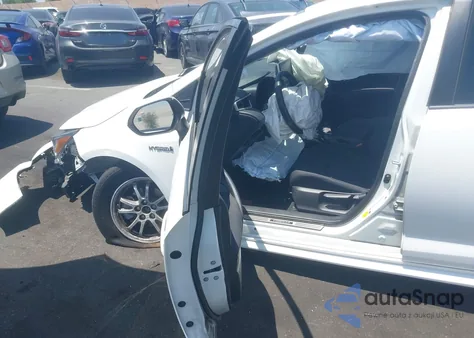 2021 Toyota Corolla Hybrid Le from USA, damaged, VIN JTDEAMDE2MJ031122